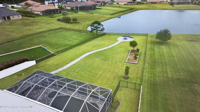 Ideally located in a Cul De Sac backing to a large lake, this - photo 11