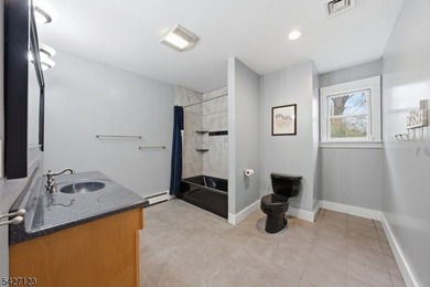 Experience this MASSIVE Colonial featuring 2 BEDROOMS & FULL - photo 25