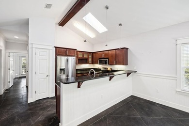 This 3 bedroom, 2 bathroom cottage offers a compelling - photo 7