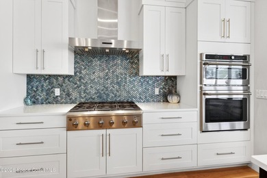 Ideally located in a Cul De Sac backing to a large lake, this - photo 32