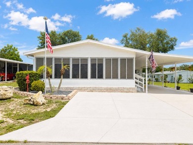 Welcome to Lake Griffin Isles, a sought-after waterfront 55+ - photo 1
