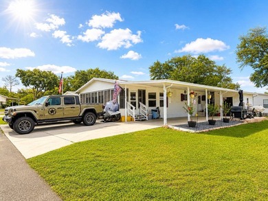 Welcome to Lake Griffin Isles, a sought-after waterfront 55+ - photo 2