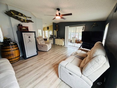 Welcome to Lake Griffin Isles, a sought-after waterfront 55+ - photo 6