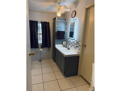 Welcome to Lake Griffin Isles, a sought-after waterfront 55+ - photo 10