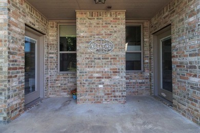 This cozy Medicine Park home has it all: Serene views of the - photo 12