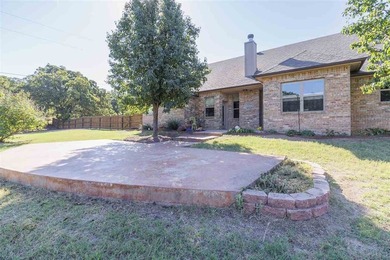 This cozy Medicine Park home has it all: Serene views of the - photo 14