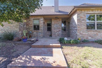 This cozy Medicine Park home has it all: Serene views of the - photo 15