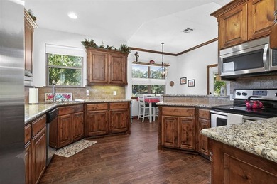 This cozy Medicine Park home has it all: Serene views of the - photo 22