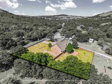 This cozy Medicine Park home has it all: Serene views of the - photo 45