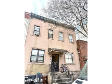Great Opportunity to own this 4 Family House in the Heart of - photo 1