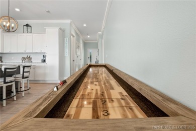 Experience lake lifestyle from the top floor of furnished 3 - photo 24