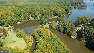 Waterfront lot with dock in Blue Ridge Shores: Nestled within - photo 25