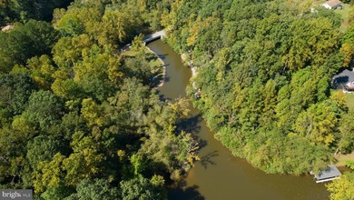Waterfront lot with dock in Blue Ridge Shores: Nestled within - photo 26