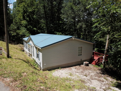 Waterfront home with a dock in Fentress Hideout! - photo 25