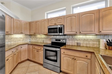 Located in the prestigious Grand Harbor community, this - photo 8