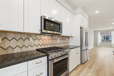 Beautifully designed 4-bedroom, 3-bathroom condo offering - photo 18