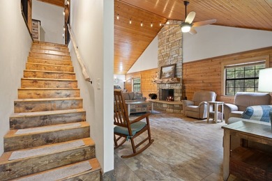 Well-appointed and full of rustic elegance, this beautiful log - photo 3