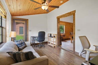 Well-appointed and full of rustic elegance, this beautiful log - photo 8
