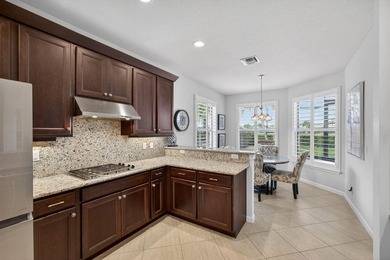 GORGEOUS golf views within Jupiter Country Club! Ideally set on - photo 25
