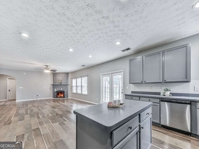 Lake & Golf Cart Living! This beautiful, spacious home offers 5