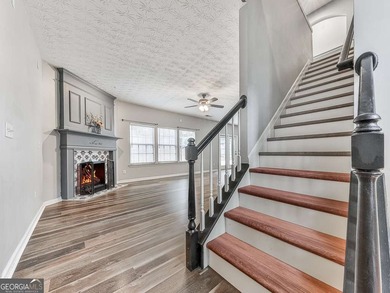 Lake & Golf Cart Living! This beautiful, spacious home offers 5