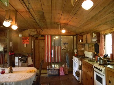 Discover a rare opportunity to own a camp within the heart of - photo 3
