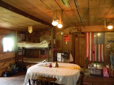 Discover a rare opportunity to own a camp within the heart of - photo 5