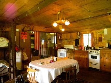 Discover a rare opportunity to own a camp within the heart of - photo 7