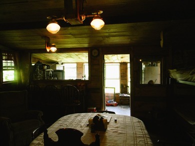 Discover a rare opportunity to own a camp within the heart of - photo 8