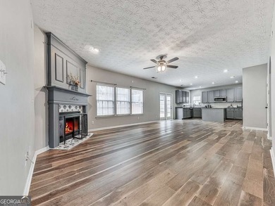 Lake & Golf Cart Living! This beautiful, spacious home offers 5