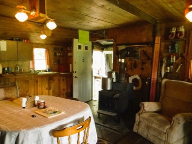 Discover a rare opportunity to own a camp within the heart of - photo 9