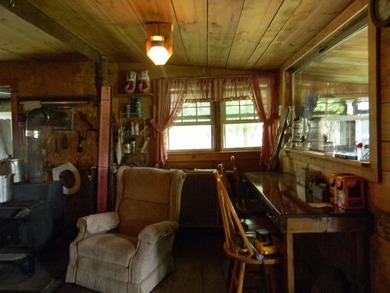 Discover a rare opportunity to own a camp within the heart of - photo 10