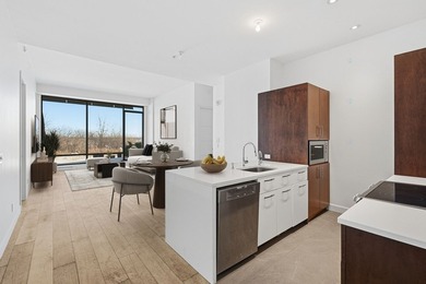 Located in the prestigious EVOLO project on Ile-des-Soeurs, this - photo 3