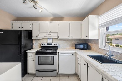 Virtually Staged. Two-bedroom condominium on the top floor with - photo 3