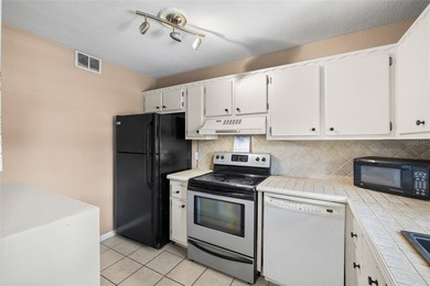 Virtually Staged. Two-bedroom condominium on the top floor with - photo 5