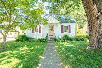 Welcome home to this charming Cape Cod nestled in the heart of - photo 1