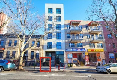 This versatile 1,476 sqft office at 58th St & 6th Ave, currently - photo 1