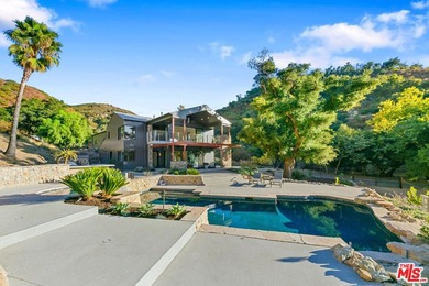 A rare Malibu sanctuary offering the best of both worlds-the - photo 11