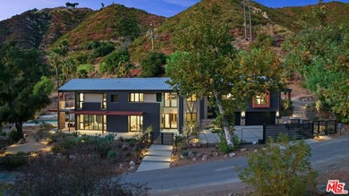 A rare Malibu sanctuary offering the best of both worlds-the - photo 14