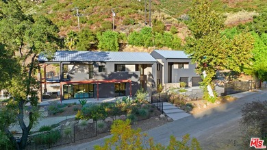 A rare Malibu sanctuary offering the best of both worlds-the - photo 21