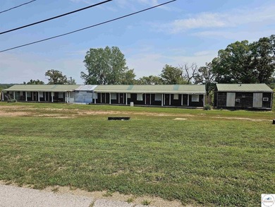 Formerly a 16-room motel with one 24 x 24 cabin. Owner has - photo 4