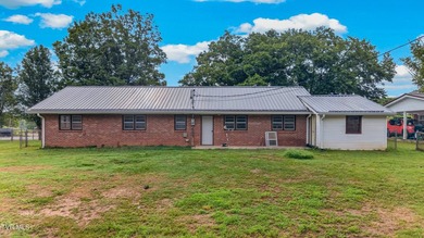 Charming 4-bedroom brick ranch with space, updates, and a prime - photo 3
