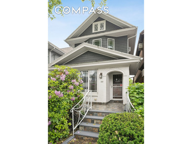 Welcome to 1982 E 23rd St, a charming detached single-family - photo 2