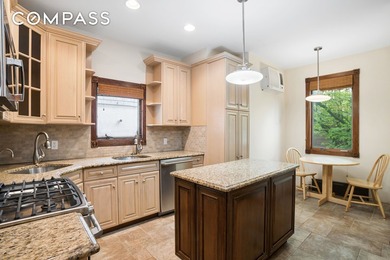 Welcome to 1982 E 23rd St, a charming detached single-family - photo 7