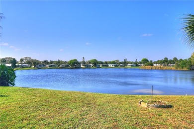 Coastal Sophistication with Stunning Lake Views! This - photo 3