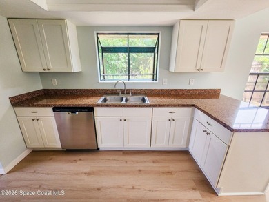 Welcome to this updated 3-bedroom, 2-bath home in Northwest Palm - photo 17