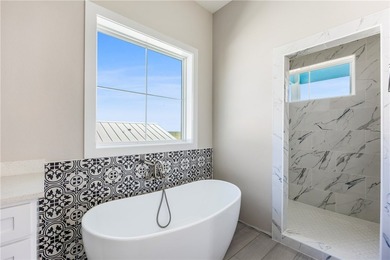 Enjoy Coastal Living in this beautiful new Beach home by Steve's - photo 23