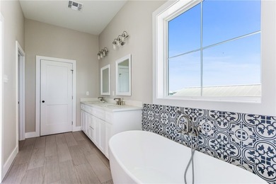 Enjoy Coastal Living in this beautiful new Beach home by Steve's - photo 25