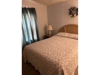 Welcome to this well kept 2 bedroom, 2 bathroom manufactured - photo 11