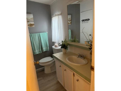 Welcome to this well kept 2 bedroom, 2 bathroom manufactured - photo 18